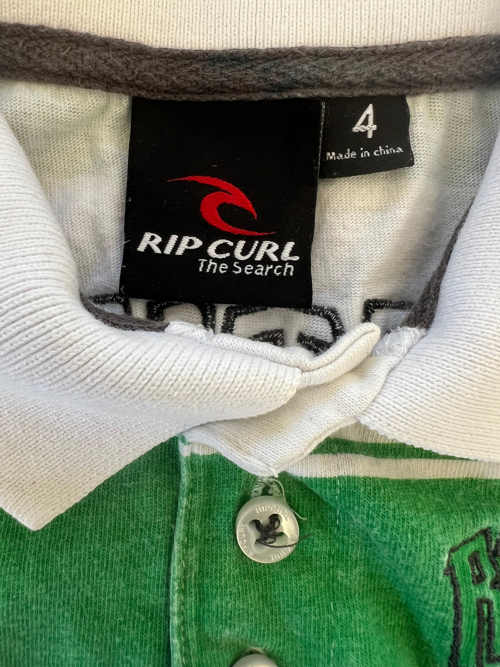 Vintage Ripcurl Polo (size 4)